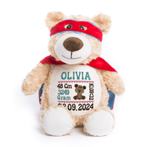 Bamse med navn og dato brodert på magen.